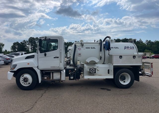2023 Hino L6 4X2 Diesel (1500-Gallon 1100/400) Huber PR-15 “Carbon Steel” Portable Restroom Truck